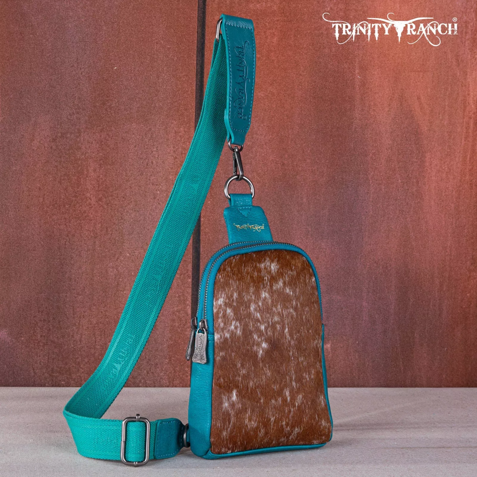 Trinity Ranch Tooled Turquoise Sling Bag